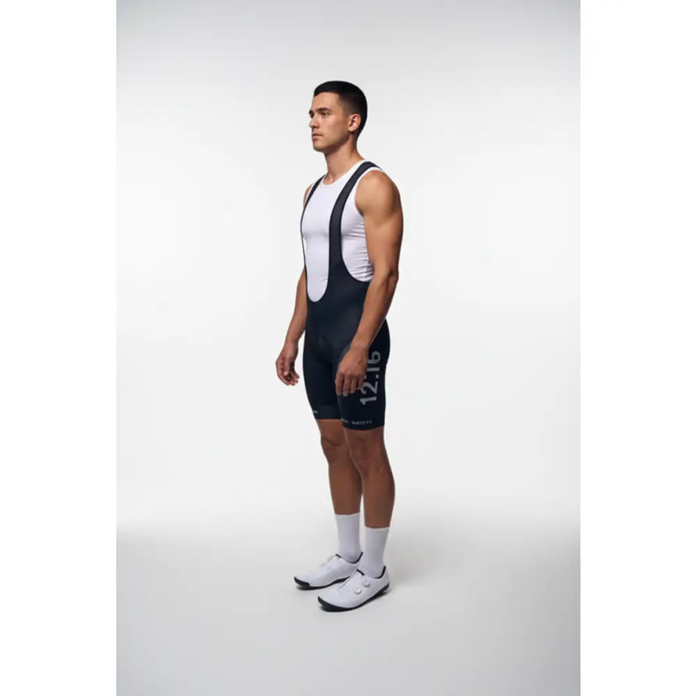 Person wearing  black TwelveSixteen Bibs
